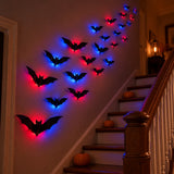 LED bats flying up a staircase wall