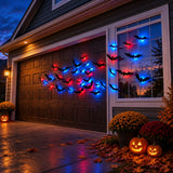 LED bats glowing on the front of a house at night