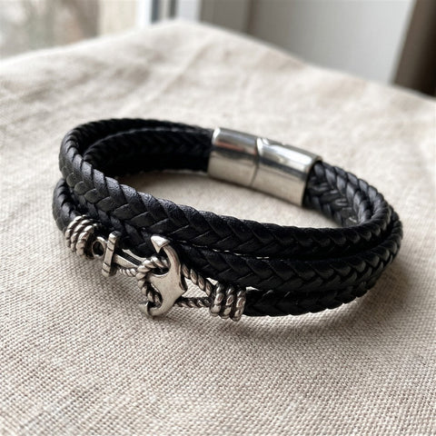 Close-up of the braided leather weave and anchor clasp